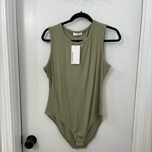 Olive Green Sleeveless Bodysuit
The brand is not Artizia.